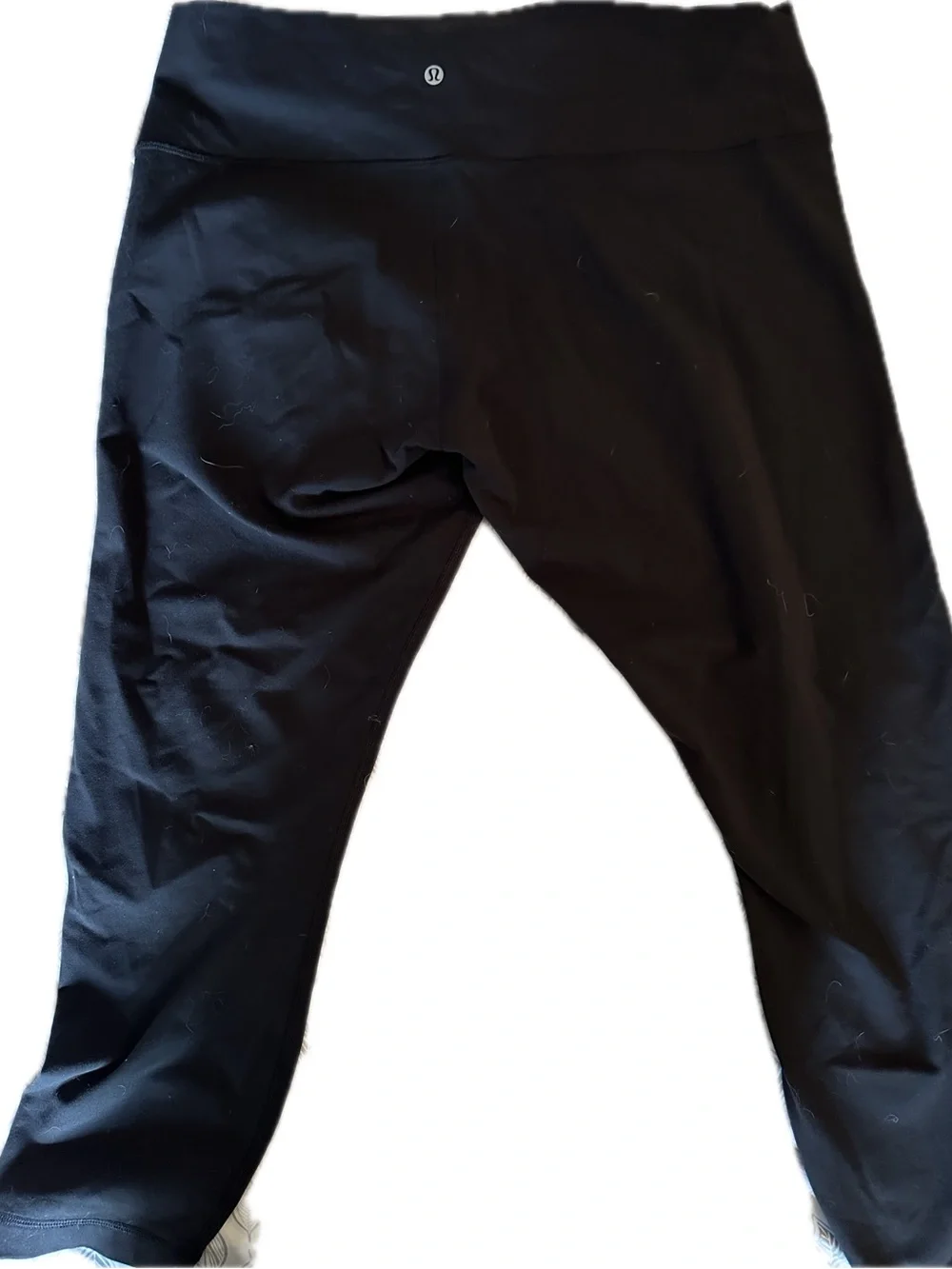 Classic black Lululemon cropped leggings in women’s size 18
